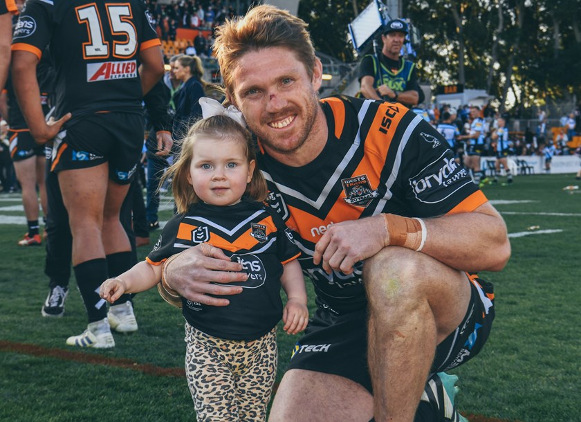 Wests Tigers forward Chris Lawrence and daughter Emmerson at Leichhardt Oval