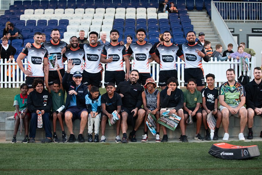 Greg Inglis with Wests Tigers players and his little mates from Tamworth 