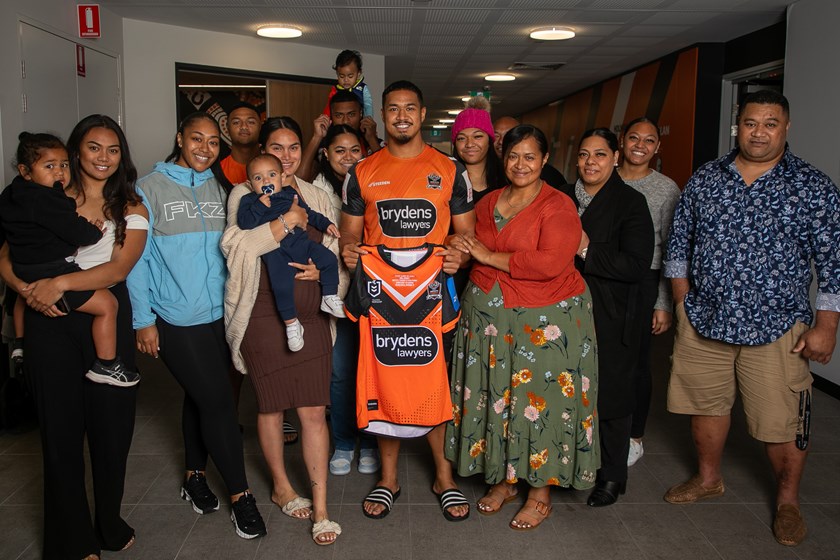 Sione presented with his NRL jersey with his family by his side at the Zurich Centre