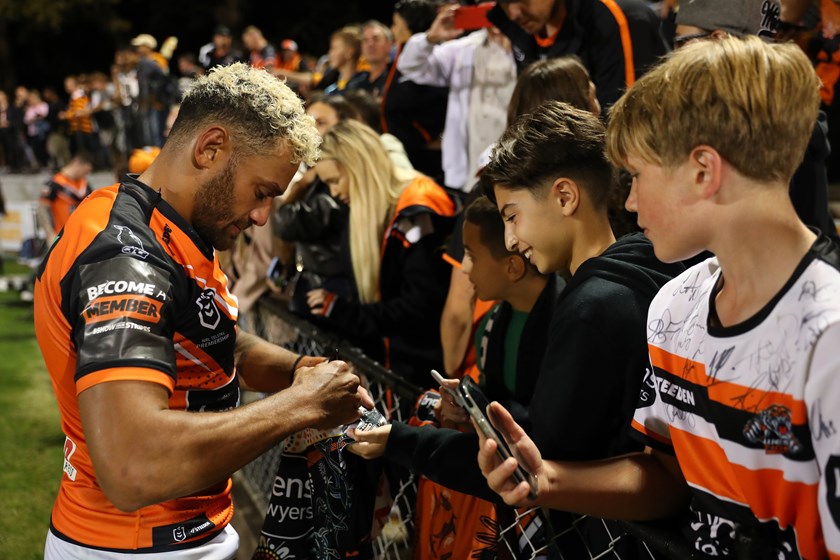 Api signing autographs after masterful performance against the Sharks in Round 3 