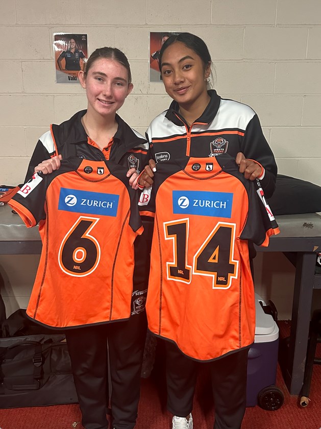 Ellie Barnett and Lucyannah Luamanu-Leiataua holding their debut NSW Women's Premiership jerseys.