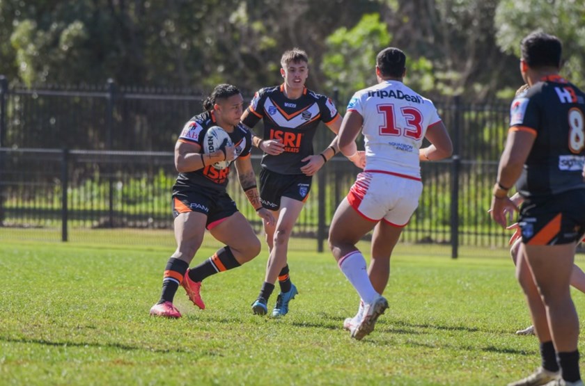 Sione Vaihu looks to beat Dragons defenders