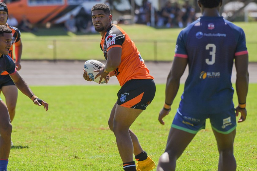 Vaka Aho carries the ball against the Silktails in Round 1