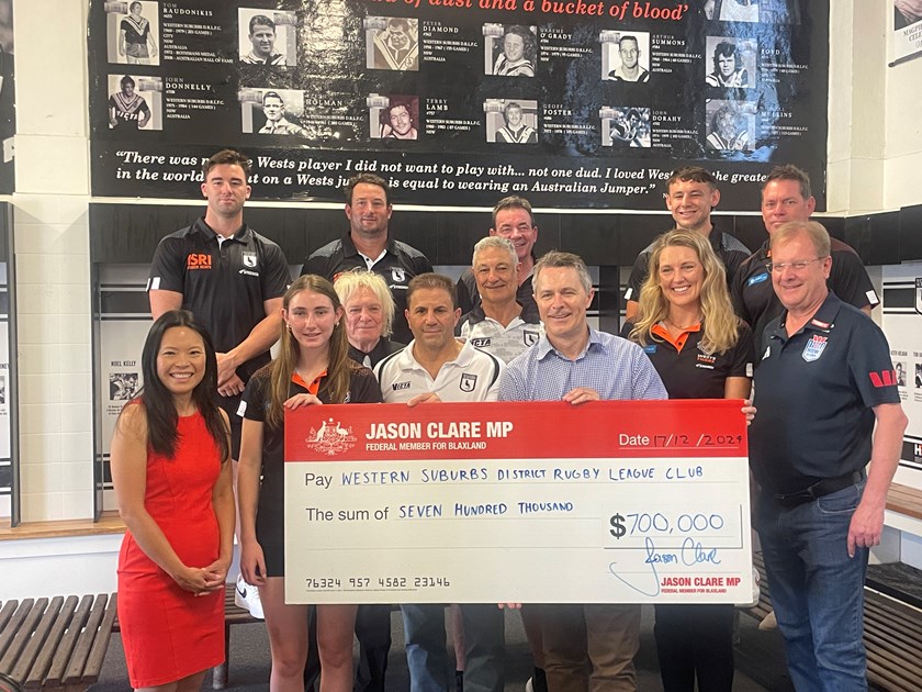 Back (L-R): Wests Magpies player Charlie Murray, Wests Magpies Head Coach Aaron Payne, Wests Magpies board member Bob Cairns, Wests Magpies player Cayne Nicholas, Wests Tigers NRLW Head Coach Brett Kimmorley 

|

Front (L-R): Member for Reid Sally Sitou MP, Wests Tigers Pathways player Ellie Barnett, Wests Tigers board member Dennis Burgess, Wests Magpies General Manager Leo Epifania, Wests Magpies board member Allan Fallah, Federal Minister for Education Jason Clare, Wests Tigers Women's Football Manager Jess Bygate, NSWRL CEO David Trodden